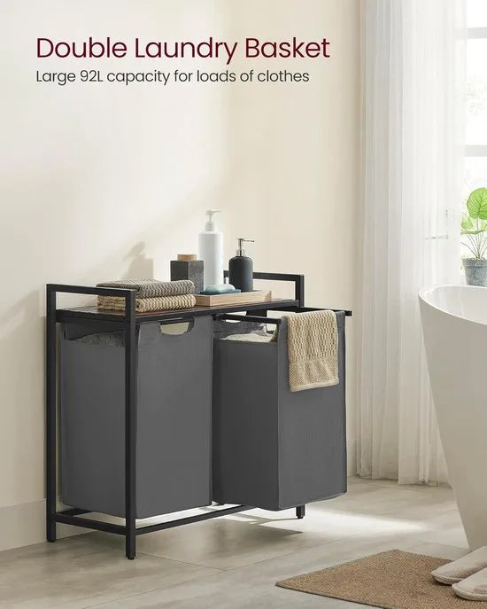 FurnStar - Wasmand - Wasmand met 2 compartimenten - Uittrekbare en verwijderbare waszakken - Wassorteerder - Plank - Metalen frame - 2 x 46L - 73 x 33 x 72 cm - Rustiek bruin en grijs