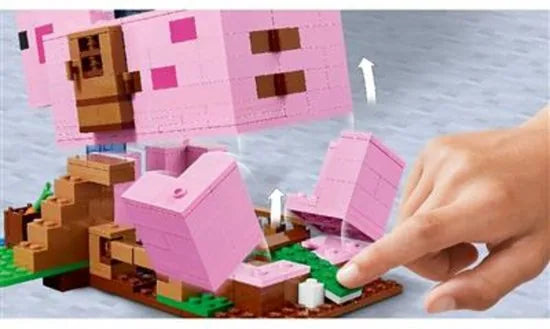 LEGO® MinecraftTM Het varkenshuis 21170; ben je op zoek naar een leuk Minecraft cadeau voor kinderen? Dit coole LEGO speelgoed voor Minecraft spelers bevat Alex, een CreeperTM en een huis in de vorm van een reusachtig varken om zelf te bouwen (490 on